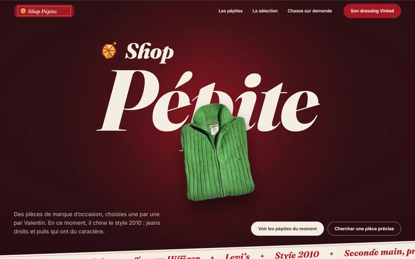 Le haut du site Shop Pépite sur ordinateur, sur fond bordeaux, avec un pull vert au centre